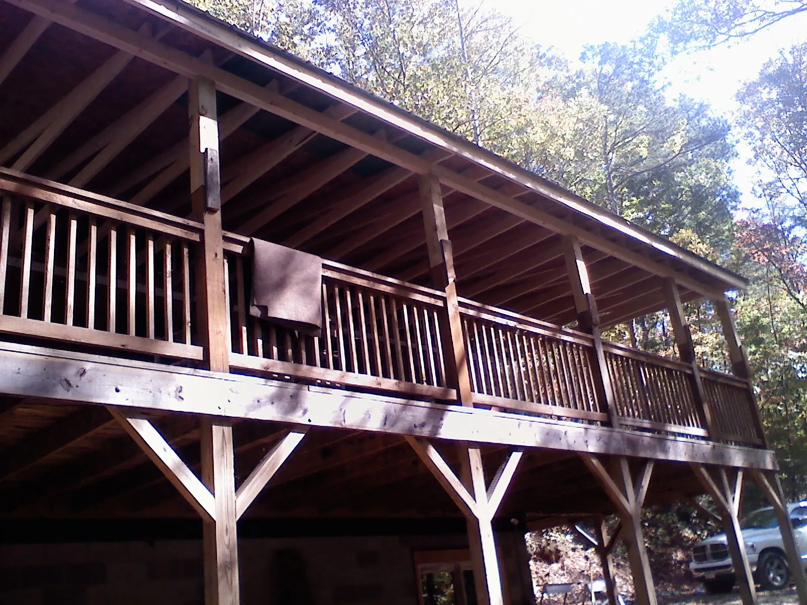 Timber framing under a new elevated porch and deck — Roof Leak Repair in Columbus Junction by Roofing Brothers
